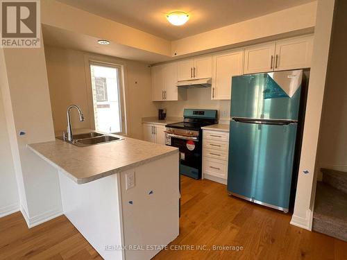 10C Lookout Drive, Clarington, ON - Indoor Photo Showing Kitchen With Double Sink
