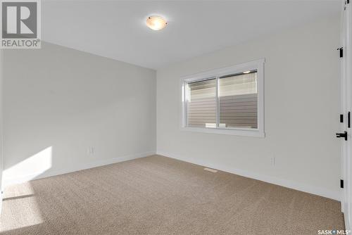 319 Dziadyk Bend, Saskatoon, SK - Indoor Photo Showing Other Room