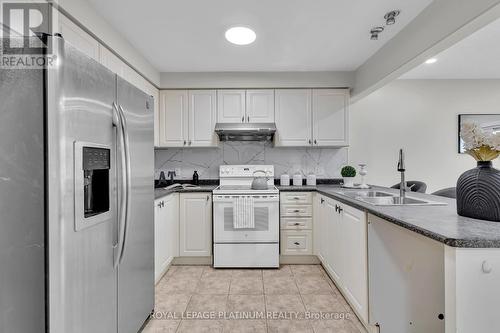 140 Windflower Drive, Kitchener, ON - Indoor Photo Showing Kitchen With Double Sink
