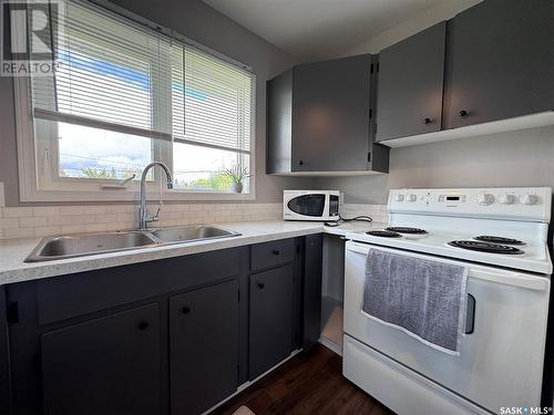 4 Clayton Street, Quill Lake, SK - Indoor Photo Showing Kitchen With Double Sink