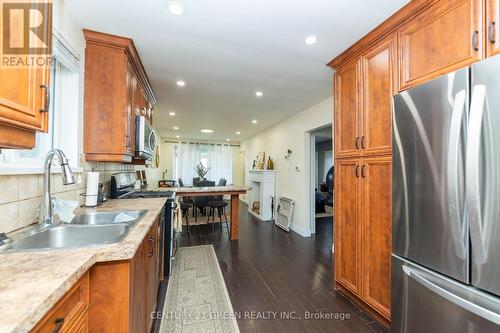 52 The Queensway Way, Toronto (High Park-Swansea), ON - Indoor Photo Showing Kitchen With Double Sink