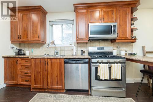 52 The Queensway Way, Toronto (High Park-Swansea), ON - Indoor Photo Showing Kitchen With Double Sink