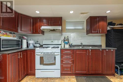 52 The Queensway Way, Toronto (High Park-Swansea), ON - Indoor Photo Showing Kitchen With Double Sink