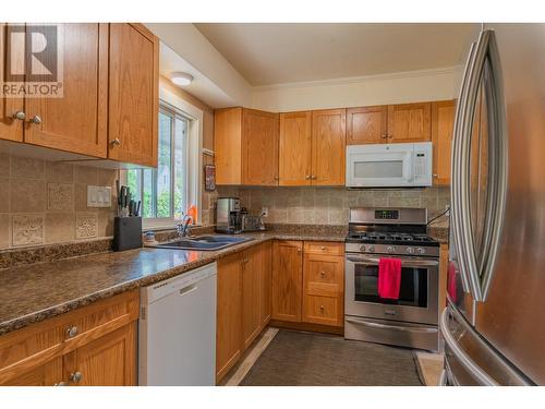 1402 Tulip  Street, Trail, BC - Indoor Photo Showing Kitchen With Double Sink