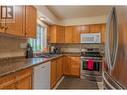 1402 Tulip  Street, Trail, BC  - Indoor Photo Showing Kitchen With Double Sink 