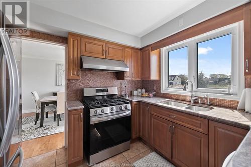 2405 Roxborough, Windsor, ON - Indoor Photo Showing Kitchen With Double Sink