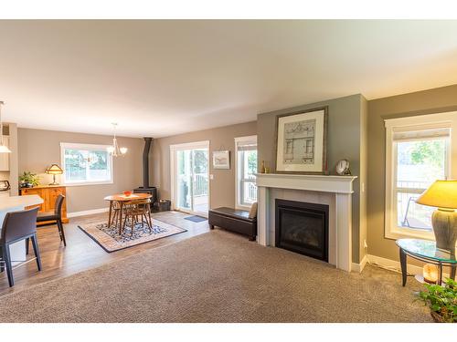5810 Highway 3A, Nelson, BC - Indoor Photo Showing Living Room With Fireplace