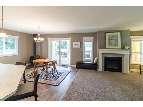 5810 Highway 3A, Nelson, BC - Indoor Photo Showing Living Room With Fireplace