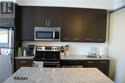 402 - 360 Square One Drive, Mississauga, ON - Indoor Photo Showing Kitchen With Upgraded Kitchen