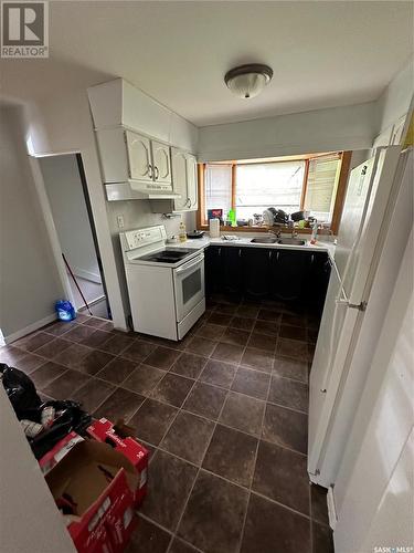 4440 Acadia Drive, Regina, SK - Indoor Photo Showing Kitchen With Double Sink