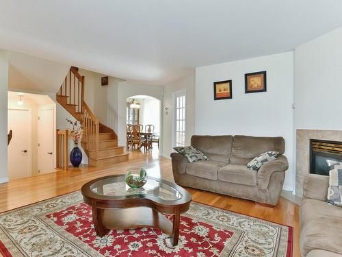 Living room - 990 Rue Palardy, Laval (Auteuil), QC - Indoor Photo Showing Living Room With Fireplace