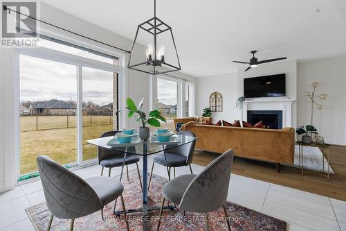 649 Tull Street E, Strathroy-Caradoc, ON - Indoor Photo Showing Dining Room With Fireplace