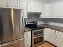 306 - 105 Knighton Rd, Kimberley, BC  - Indoor Photo Showing Kitchen With Stainless Steel Kitchen 