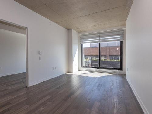 Living room - 408-10850 Rue Basile-Routhier, Montréal (Ahuntsic-Cartierville), QC - Indoor Photo Showing Other Room