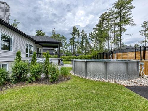 Piscine - 16985 Rue Du Zircon, Mirabel, QC - Outdoor With Above Ground Pool