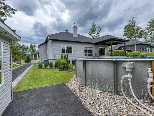 Piscine - 16985 Rue Du Zircon, Mirabel, QC - Outdoor With Above Ground Pool