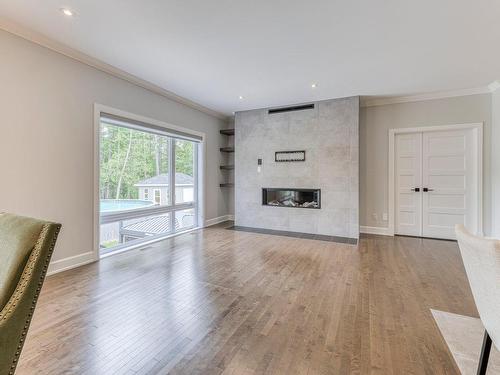 Salon - 16985 Rue Du Zircon, Mirabel, QC - Indoor Photo Showing Living Room With Fireplace