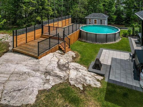 Photo aÃ©rienne - 16985 Rue Du Zircon, Mirabel, QC - Outdoor With Above Ground Pool With Backyard