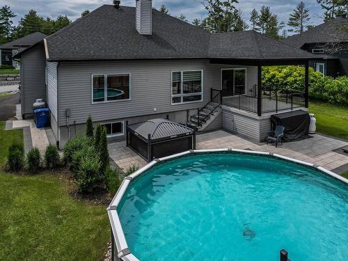 Piscine - 16985 Rue Du Zircon, Mirabel, QC - Outdoor With Above Ground Pool