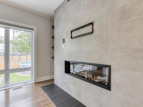 Salon - 16985 Rue Du Zircon, Mirabel, QC - Indoor Photo Showing Living Room With Fireplace