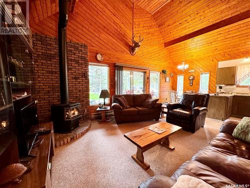 209 Al Drive, Turtle Lake, SK - Indoor Photo Showing Living Room With Fireplace