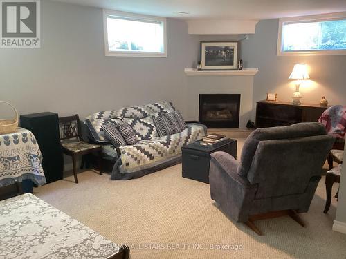 27 Laurent Boulevard, Kawartha Lakes, ON - Indoor Photo Showing Living Room With Fireplace