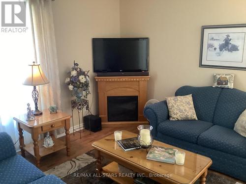 27 Laurent Boulevard, Kawartha Lakes (Lindsay), ON - Indoor Photo Showing Living Room With Fireplace