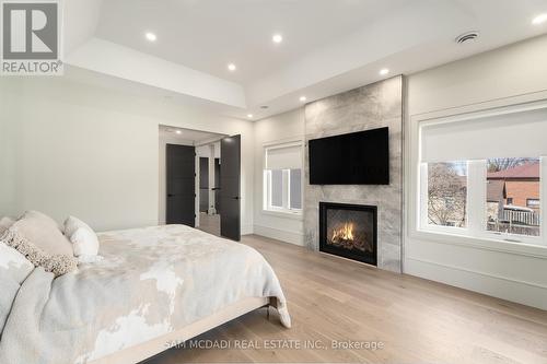 1019 Strathy Avenue, Mississauga, ON - Indoor Photo Showing Bedroom With Fireplace