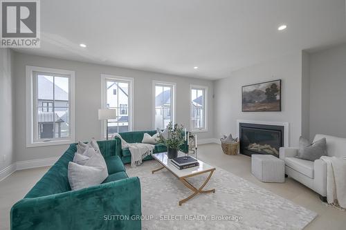 3 - 2835 Sheffield Place, London, ON - Indoor Photo Showing Living Room With Fireplace