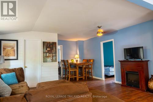 13 Elmwood Avenue, Lambton Shores (Grand Bend), ON - Indoor Photo Showing Living Room With Fireplace