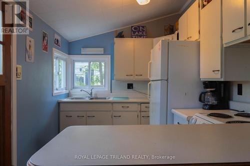 13 Elmwood Avenue, Lambton Shores (Grand Bend), ON - Indoor Photo Showing Kitchen With Double Sink