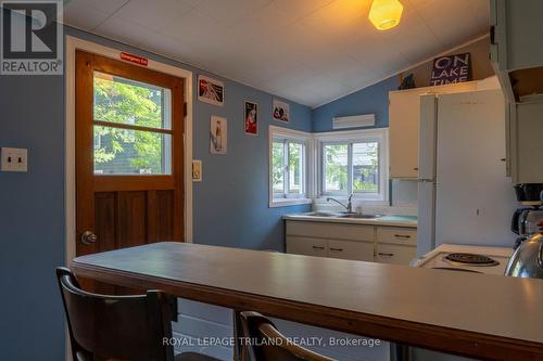 13 Elmwood Avenue, Lambton Shores (Grand Bend), ON - Indoor Photo Showing Kitchen With Double Sink