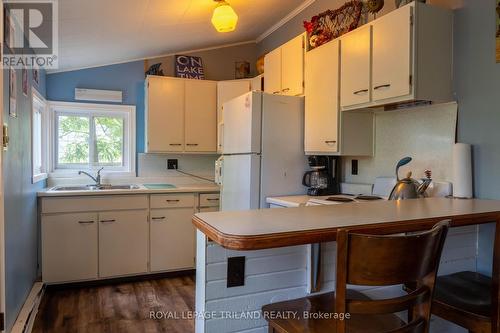 13 Elmwood Avenue, Lambton Shores (Grand Bend), ON - Indoor Photo Showing Kitchen With Double Sink