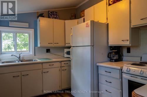 13 Elmwood Avenue, Lambton Shores (Grand Bend), ON - Indoor Photo Showing Kitchen With Double Sink