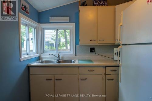 13 Elmwood Avenue, Lambton Shores (Grand Bend), ON - Indoor Photo Showing Kitchen With Double Sink