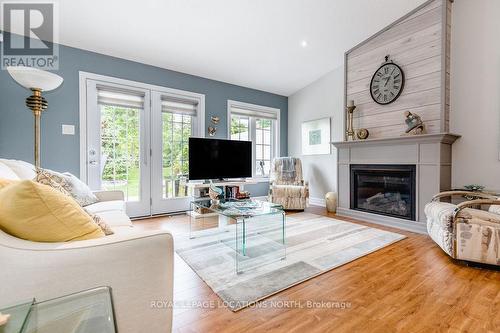 34 New York Avenue, Wasaga Beach, ON - Indoor Photo Showing Living Room With Fireplace