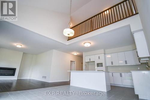 3193 Searidge Street, Severn (West Shore), ON - Indoor Photo Showing Kitchen With Fireplace