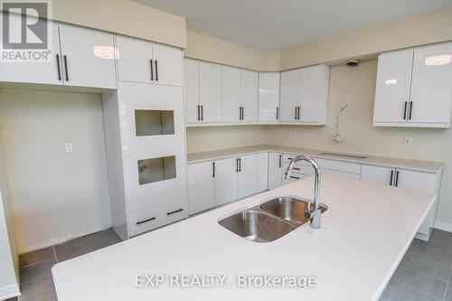 3193 Searidge Street, Severn (West Shore), ON - Indoor Photo Showing Kitchen With Double Sink