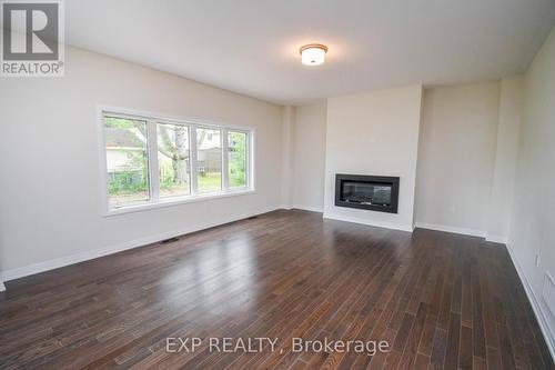 3193 Searidge Street, Severn (West Shore), ON - Indoor Photo Showing Living Room With Fireplace