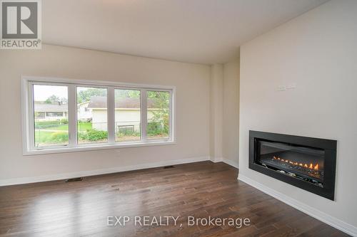 3193 Searidge Street, Severn (West Shore), ON - Indoor Photo Showing Living Room With Fireplace