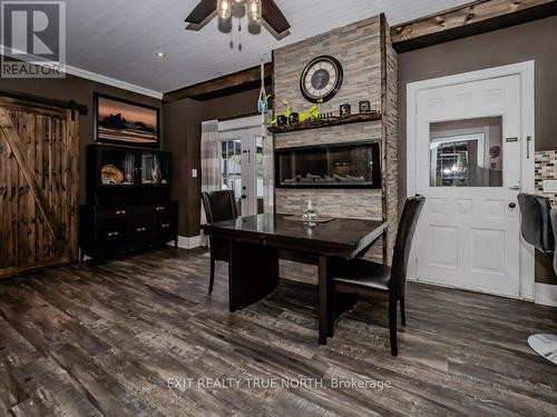 74 Taylor Road, Bracebridge, ON - Indoor Photo Showing Dining Room With Fireplace