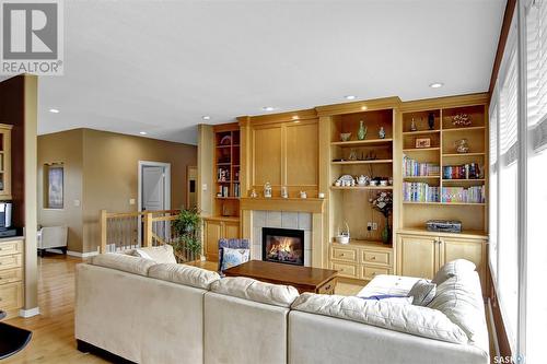 9283 Wascana Mews, Regina, SK - Indoor Photo Showing Living Room With Fireplace