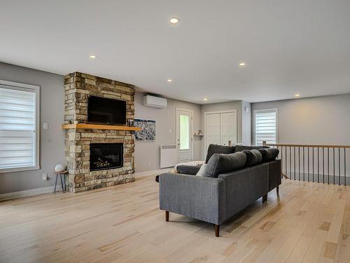 Salon - 416 Ch. De Montfort, Piedmont, QC - Indoor Photo Showing Living Room With Fireplace