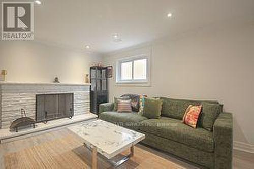 2009 Delaney Drive, Mississauga, ON - Indoor Photo Showing Living Room With Fireplace