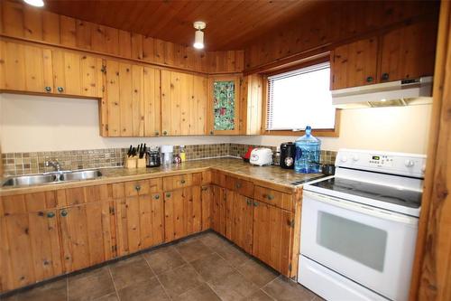 407 Patrick Avenue, The Pas, MB - Indoor Photo Showing Kitchen With Double Sink