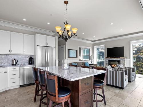 13B-1000 Sookepoint Pl, Sooke, BC - Indoor Photo Showing Kitchen With Fireplace With Upgraded Kitchen