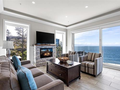 13B-1000 Sookepoint Pl, Sooke, BC - Indoor Photo Showing Living Room With Fireplace