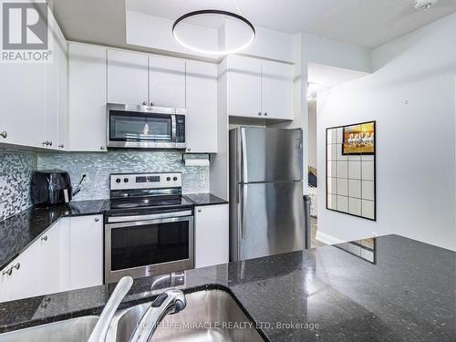 308 - 65 Yorkland Boulevard, Brampton, ON - Indoor Photo Showing Kitchen With Stainless Steel Kitchen With Double Sink With Upgraded Kitchen