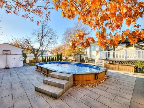 Pool - 4262 Rue Clément, Terrebonne (Lachenaie), QC - Outdoor With Above Ground Pool With Backyard