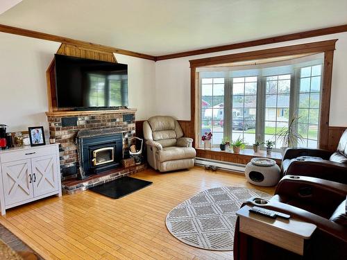 Living room - 240 Ch. De La Grande-Allée, Les Îles-De-La-Madeleine, QC - Indoor Photo Showing Living Room With Fireplace